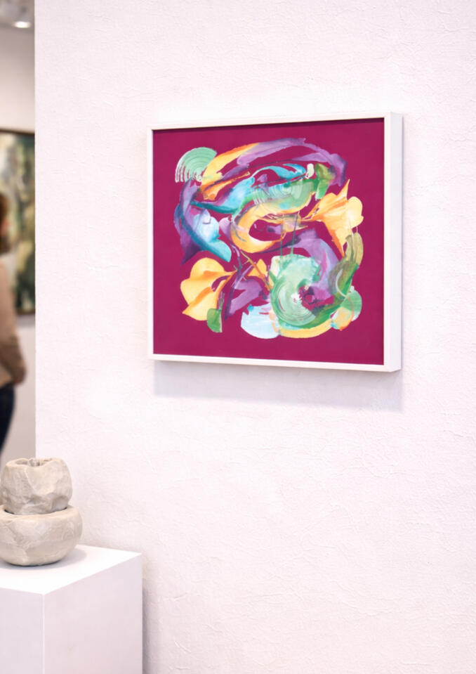 "Play in Red No. 1" a 20x20 painting, hung in gallery with white frame. Framed abstract painting with bold magenta background displayed on a white gallery wall painted by Roxenya.